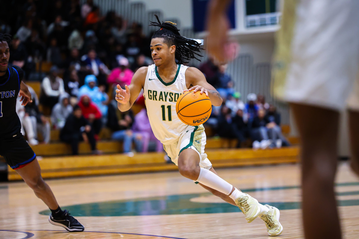 Grayson senior guard CJ Hyland drives to the basket during Tuesday night's 76-70 win over Newton. (Photo: Colin Hubbard)